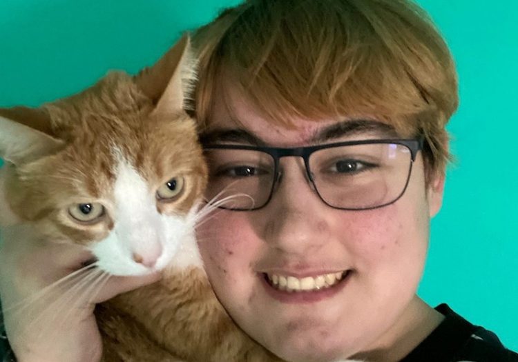 Ace, person served by NeuroRestorative with his cat